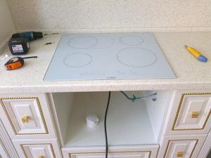 Comment installer la table de cuisson