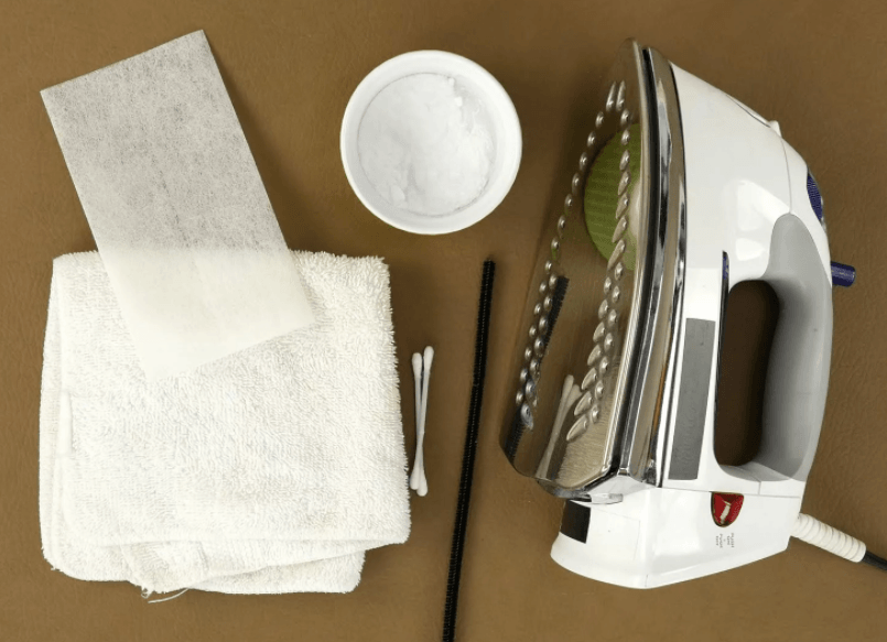 Nous nettoyons le fer avec de la soude